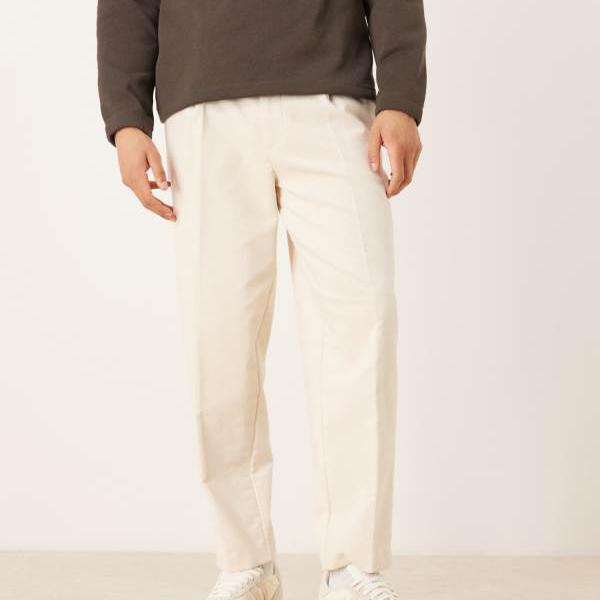 エイソス ASOS asos ASOS DESIGN かっこ良いなオーバーサイズテーパードプリーツパンツ（エクリュコーデュロイ） ズボン下 下つ方 メンズ 成人男性 インポートブランド 弱められた大きさから馬鹿でかい大きさまで