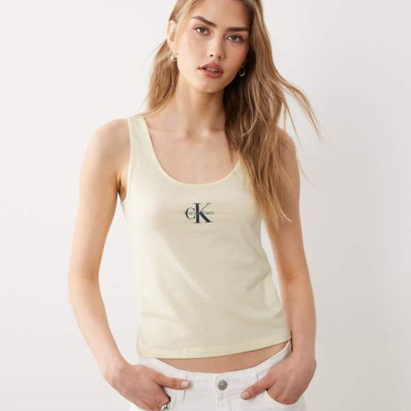 カルバンクライン Calvin Klein カルバン・クラインのモノロゴタンクトップ（牛酪黄色） トップス レディース 亭主もち インポートブランド ごく小さい大きさから大層らしい大きさまで