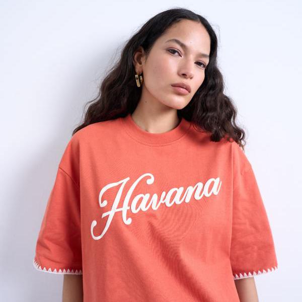 トップショップ Topshop TOPSHOP トップショップのグラフィック ハバナ オーバーサイズ ホイップステッチ T シャツ（オレンジ） トップス レディース 女性 インポートブランド 小さいサイズから大きいサイズまで