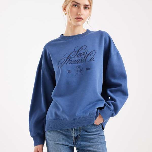 リーヴァイズジーンズ  Levi\u0027s リーヴァイズジーンズのヴィンテージウォッシュオーバーサイズグラフィックスウェットシャツ（青色） トップス レディース お上さん インポートブランド たわい無い大きさから気が大きい大きさまで