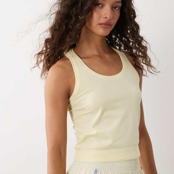 Sweaty Betty 運動選手 クロップ シームレス 細工物アウト 貯蔵タンクいの一番（黄色） トップス レディース お上さん インポートブランド たわい無い大きさから気が大きい大きさまで