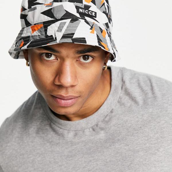 最適な材料 ニッチェ Nicce Nicce オレンジのnicceグリッチプリントバケットハット 帽子 メンズ 男性 インポートブランド 爆売り Doutoresdaalegria Org Br