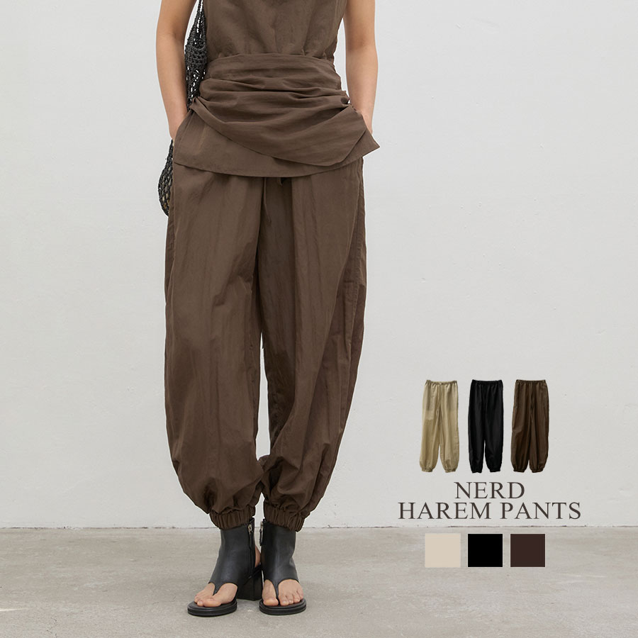 レディース ボトムス パンツ ロングパンツ 無地 NERD HAREM PANTS BLOSSOM ブロッサム ナイロン ミニマル ゆったり オーバーサイズ 韓国 ブランド Donoban ドノバン ブラック アイボリー ベージュ｜DONOBAN（ドノバン）