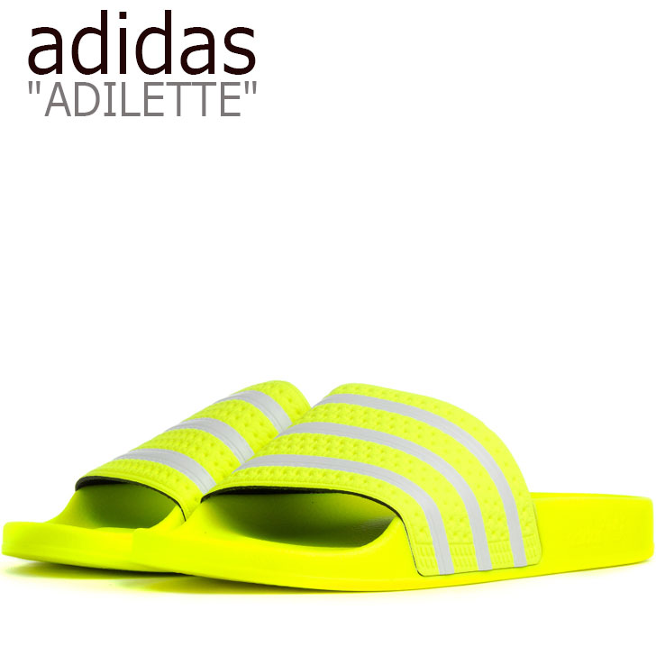 yellow adidas flip flops