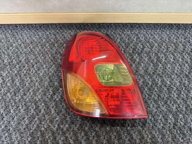 【中古】中古部品 カローラスパシオ NZE121N 左ﾃｰﾙﾗﾝﾌﾟ 【3330440100-250920000115600】