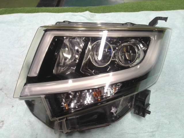 【中古】中古部品 ムーヴ LA150S 左ﾍｯﾄﾞﾗﾝﾌﾟ 【3310200100-000022413010900】