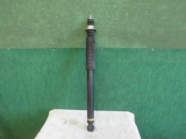 中古部品 ラティオ N17 左リアショックアブソーバー