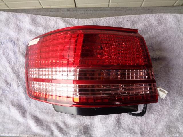 【中古】中古部品 マーククオリス SXV20W 左ﾃｰﾙﾗﾝﾌﾟ 【3340080100-000418485915600】