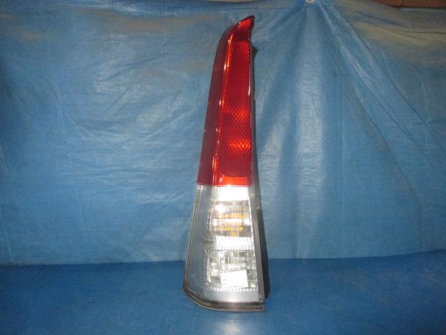 【中古】中古部品 ミラアヴィ L250S 左ﾃｰﾙﾗﾝﾌﾟ 【3310160100-001662630815600】