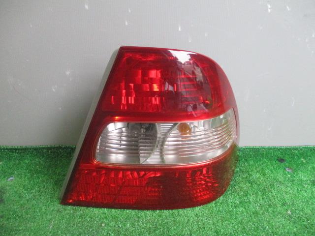 【中古】中古部品 カローラ NZE121 右ﾃｰﾙﾗﾝﾌﾟ 【3330560100-001383142015500】