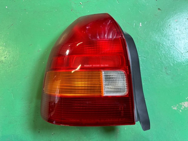 【中古】中古部品 シビック EK3 左ﾃｰﾙﾗﾝﾌﾟ 【3310180100-250426500415600】