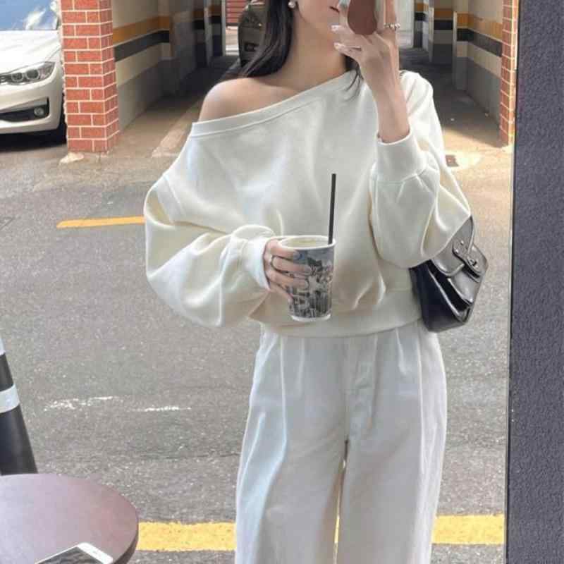 Tシャツ レディース 斜め襟 長袖 トップス カットソー 肩出し アシンメトリー 無地 ゆったり 白色 灰色 黒色