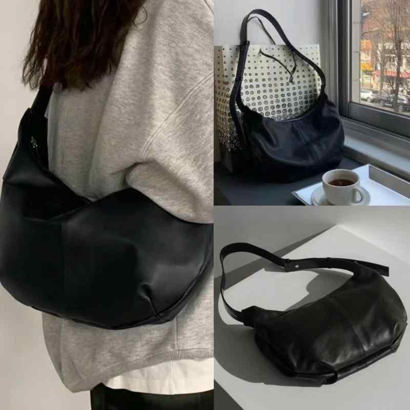 ショルダーバッグ 女性用 饅頭型 牛革 真皮 ミディアムサイズ ソフト 中間硬度 黒 白色 都市シンプル ステッチ ジッパー開閉 携帯ポケット シングルストラップ 日常通勤 普段使い 軽量 切り替えデザイン 接触冷感 再生繊維