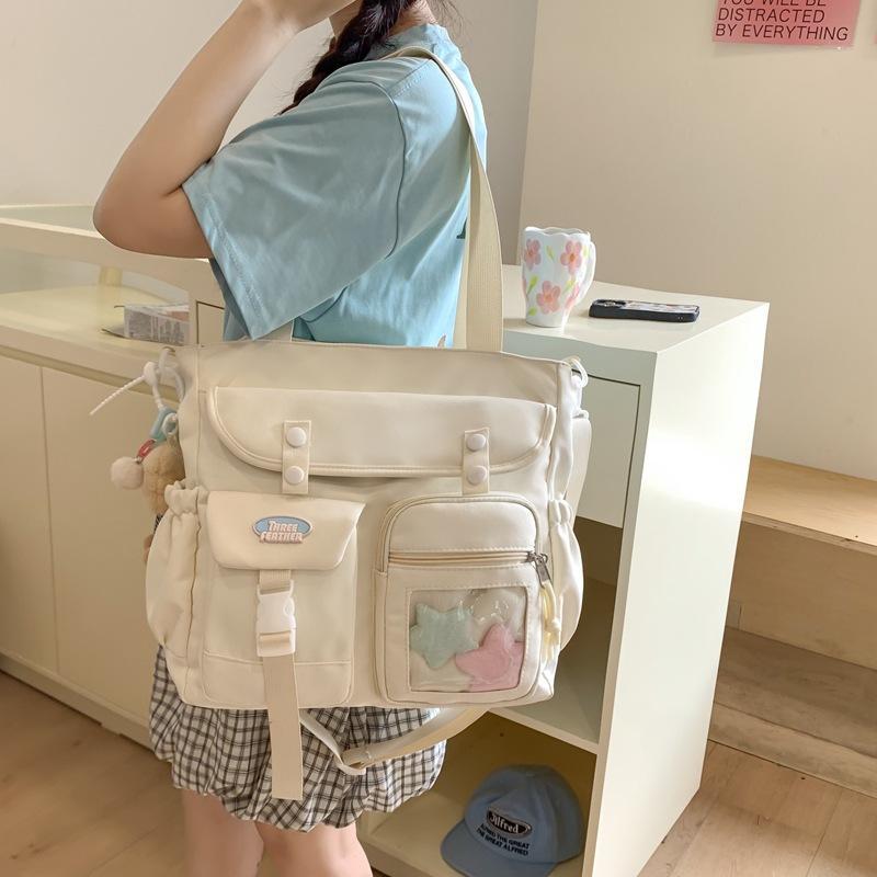学生用 メンズ バッグ ショルダーバッグ 斜めがけ ナイロン素材 トートバッグ 中型 横型 ソフト構造 ジップ開閉 撞色デザイン 単肩ストラップ 日常使い 都市スタイル 黒 白 紫 青 4,528円
