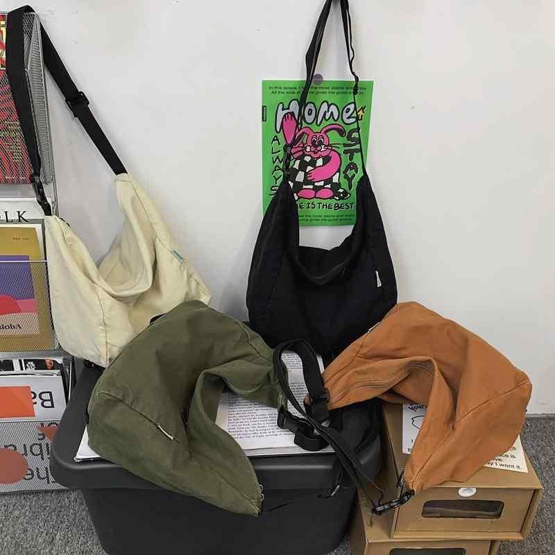 カジュアル 帆布 ショルダーバッグ 女性用 大学生向け 大容量 郵便袋風 横型 方形 ソフト シングルストラップ 日常使い 街頭スタイル ブラック グリーン ベージュ ブラウン 春季 ファッション 斜めがけ トレンド ミディアムサイズ ジッパー開閉 ジッ