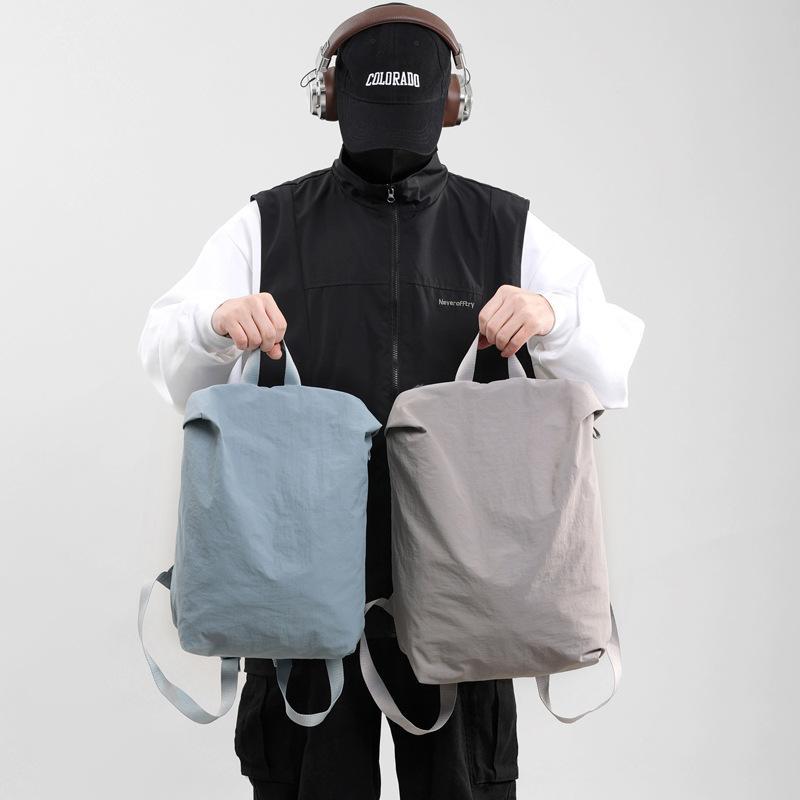 バックパック 男女兼用 ナイロン 軽量 通勤通学 日常使い 20-35L 大容量 15インチ ノートPC収納 春季 竹青緑 白灰 深空灰 ブラック 水色 イエロー ベージュ シンプル 都会風 透気性 弧形肩帯