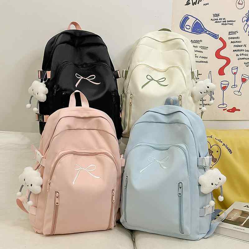 メンズ 学生 バックパック バッグ 鞄 双肩 肩掛け かわいい 蝶結び 青春 キャンパス スタイル 軽量 減負 通勤 普段使い 旅行 アウトドア ナイロン 素材 ポリエステル 裏地 クッション 背負い ベルト 20L 容量 12インチ ノートPC 収納