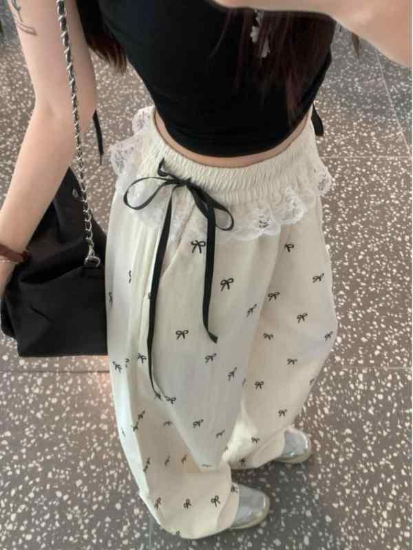 レディース ワイドパンツ ハワイアンスタイル 甘辛ミックス バタフライボウ レース 切り替え 灯籠シルエット ゆったりロング 夏用 ハイウエスト フルレングス ポケット デザイン 街頭ファッション ヨーロピアンスタイル 微弾性 ポリエステル アニメ 混合