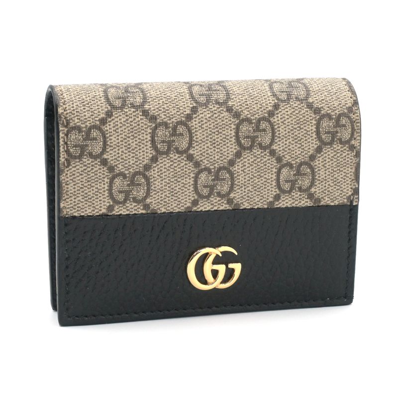 [返品差しゆるす] グッチ ダブルG バイカラーカードケースウォレット 658610 GGスプリーム 黒いこと 二つ折り紙入れ 折りたたみ紙入れ GG柄 黒 【中古】【貨物輸送無料】