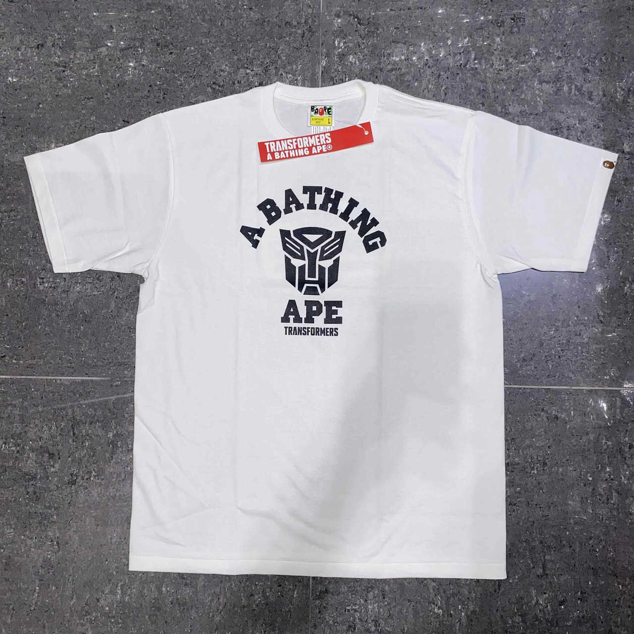 A BATHING TRANSFORMERS COLLEGE TEE 2014年 Lサイズ アベイシングエイプ トランスフォーマー 半袖Tシャツ BAPE 南堀江店【中古】