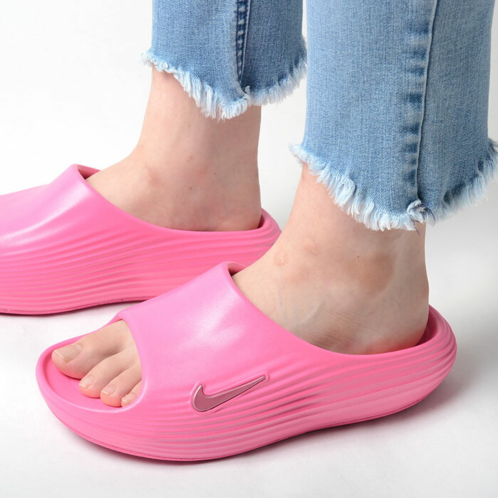 W NIKE REACTX REJUVEN8 SLIDE ウィメンズ ナイキ リアクト リジュビネイト 横すべり レディース サクラ色 サンダル hv4484-600