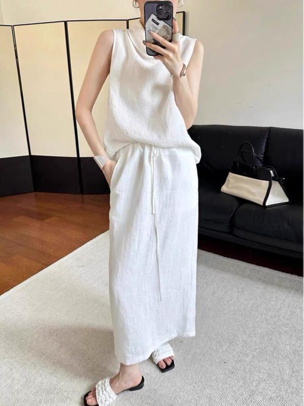 スカート 女性用 春夏 長め ミディスカート 通勤 普段使い 気質 デザイン 切り替え デザイン ドローストリング ウエスト 調整 麻 素材 100% コットンライク 軽量 微弾性 吸湿速乾 快適 ブラック ホワイト モノトーン｜emuland