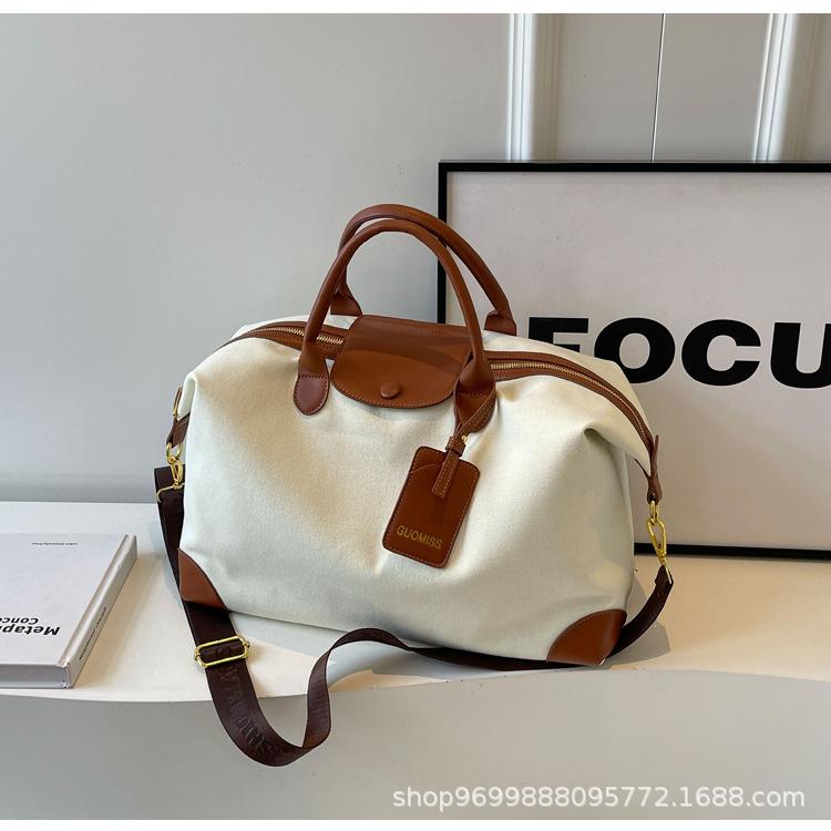パッカブル カジュアル トラベルバッグ 大容量 軽量 ショルダーバッグ 帆布 斜めがけ 鞄 機内持ち込み スポーツ 旅行バッグ レディース 出張 収納 ビジネス トートバッグ 撥水 通勤