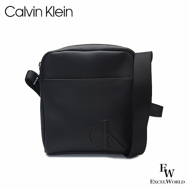 カルバンクライン バッグ 4D3248G 001 Calvin Klein ショルダーバッグ レザー エンボス モノグラム ロゴ レポーター 斜め掛け ブラック エクセルワールド 誕生日 ギフト プレゼントにも メンズ レディース ブランド おしゃれ かっこいい