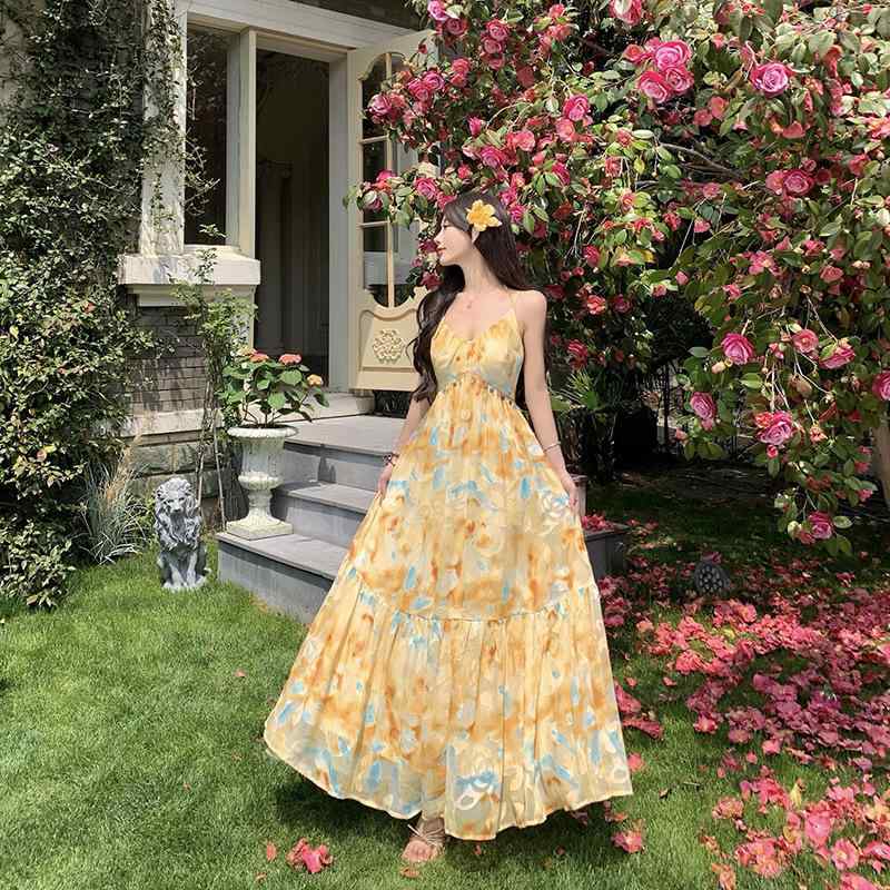 ワンピース レディース 春夏 リゾート ゆったり ストラップ ロングドレス 切り抜き 花柄 フリル ビーチ 旅行用 フェミニン 軽やか 通気性 ガーリー
