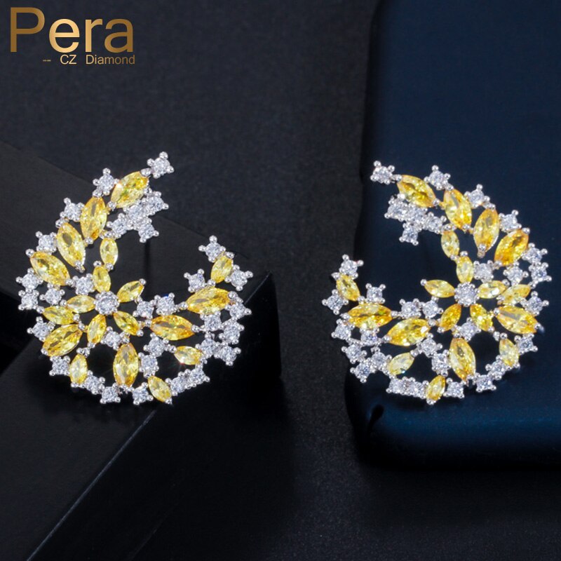 【送料無料】 】 ピアス 白 ホワイト 黄 イエロー 花 フラワー ジルコニア ピック レディース 女性 アシンメトリー デザイナー 耳 イヤー ジュエリー マーキス カット キュービック ジルコン ファッション 大 スタッド