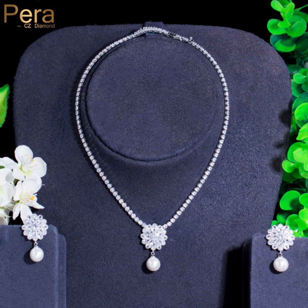 【クーポン利用で8580円】 ペンダント ピアス ネックレス 白 ホワイト ジルコニア フラワー 花 プラント 植物 パール 真珠 ロング レディース 女性 ファシネーション CZ ジルコン スノーフラワー 花 タッセル 結婚式 ウェディング ブランド ジュエリー セット
