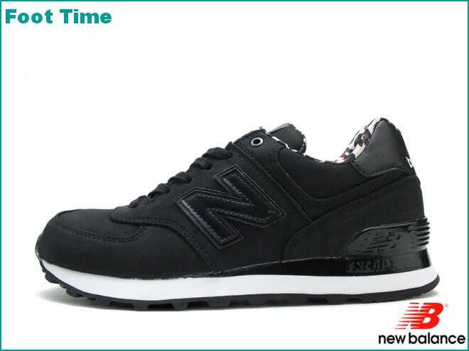 black new balance 574 on feet black new balance 574 on feet