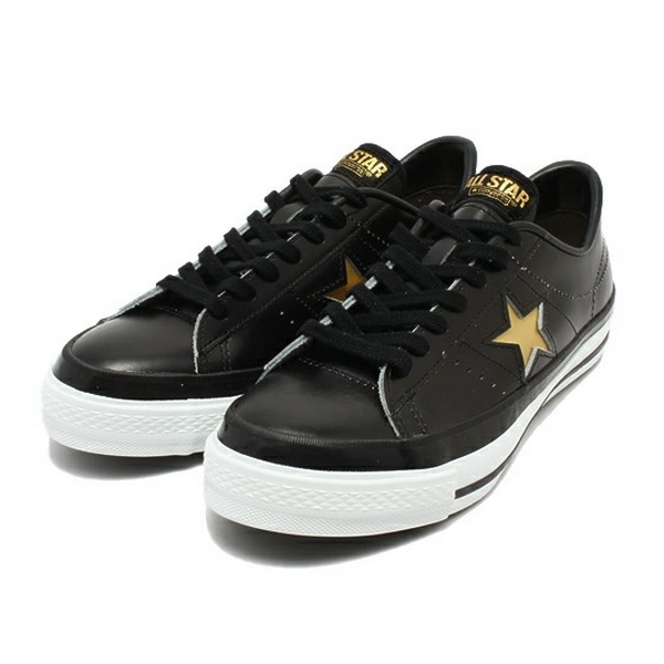 black and gold leather converse
