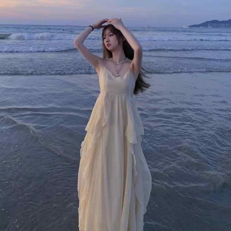 ワンピース レディース 吊り下げ 夏 海辺 度假 無袖 中長 スカート 甘い プリンセス 風 爽やか スタイル 切り替え デザイン ポリエステル 素材 杏色 ミッド ウエスト セットオン タイプ ビーチ ウェア カジュアル 普段使い 軽量 伸縮性 吸湿速