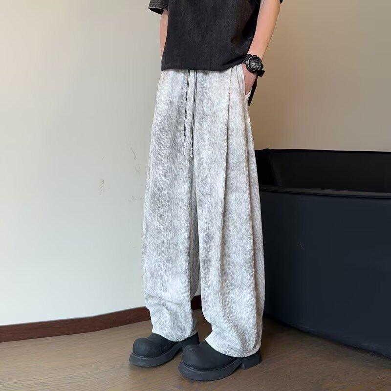 メンズ 夏季 速乾 垂感 ワイドパンツ 工装風 直筒 微ラッパー 微弾性 化繊混紡 ポリエステル 日常使い 軽量 伸縮性 吸湿速乾 ミッドライズ ロング丈 ゆったりシルエット スリム効果 黒 白 カジュアル ファッション