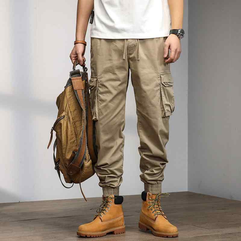 カーゴパンツ メンズ 秋冬 コットン 素材 微弾力 トレンド ルーズ フィット ハーレム スタイル コーン シェイプ ミッド ライズ ロープ クロージャー ソリッド カラー マルチ ポケット 詳細 アウトドア アクティビティ ユース 向き ブラック グレ