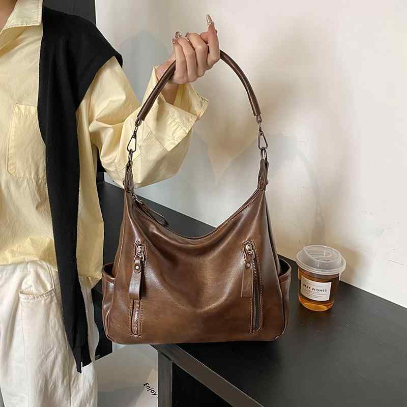 トートバッグ 女性用 大容量 斜めがけ 単肩 黒 茶色 ブラウン 横型 方形 ソフト PU素材 車縫線 ジッパー開閉 ダブル肩紐 日常使い 通勤 大学生 街頭ファッション トレンド 軽量 通年