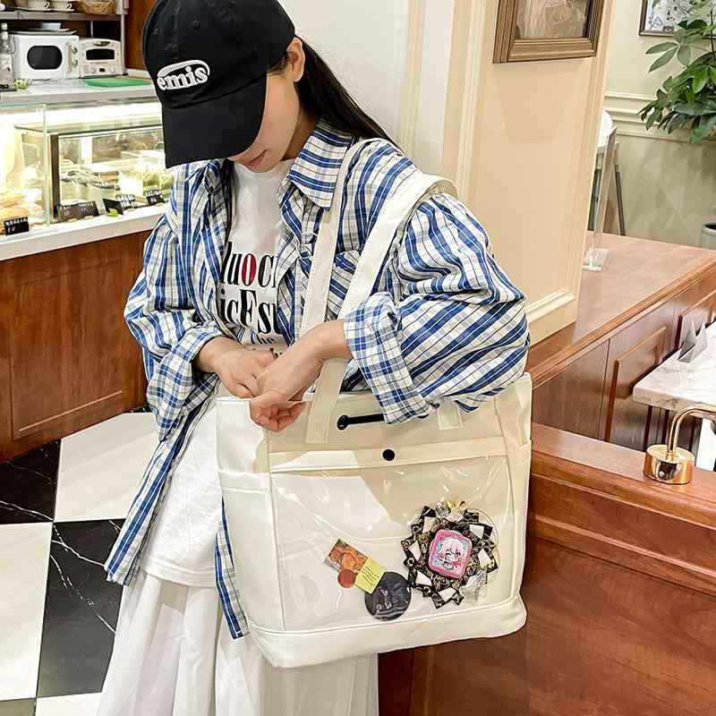 トートバッグ メンズ レディース 学生用 大容量 ナイロン 帆布 素材 横型 方形 デザイン 切り替え ステッチ 詳細 ジッパー 開閉 ソフト 構造 スマホポケット 内ポケット シングル ストラップ 肩掛け 日常 使い 通勤 通学 ストリート ファッショ