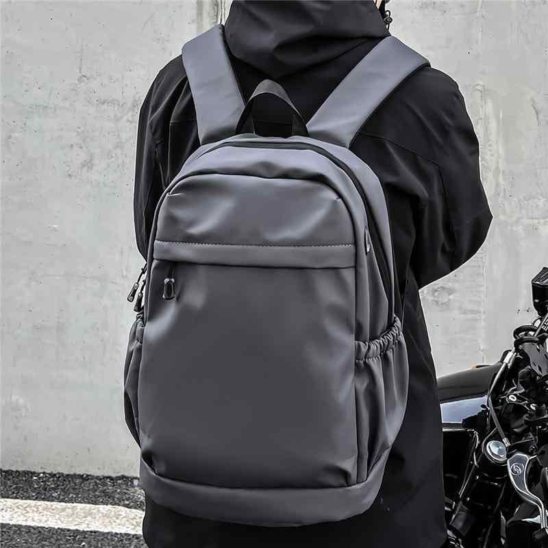 メンズ バックパック 男性用 リュックサック 肩掛けバッグ 高校生 大学生 通学 書類入れ キャンパス 街頭ファッション トレンド ストリートスタイル 黒 グレー ネイビー 純色 ソリッドカラー 皮膜素材 合成皮革 耐摩耗 耐久性 20-35L 大容量