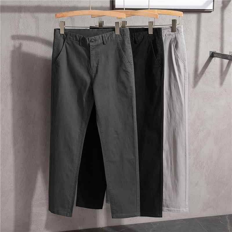 メンズ 工装パンツ 九分丈 黒 コットン 素材 微弾性 修身シルエット 直筒 デザイン 韓国風 トレンド スタイル 春秋 季節 適合 青少年 向け ゆったり フィット 普段使い 軽量 通勤 対応 シンプル カジュアル ファッション