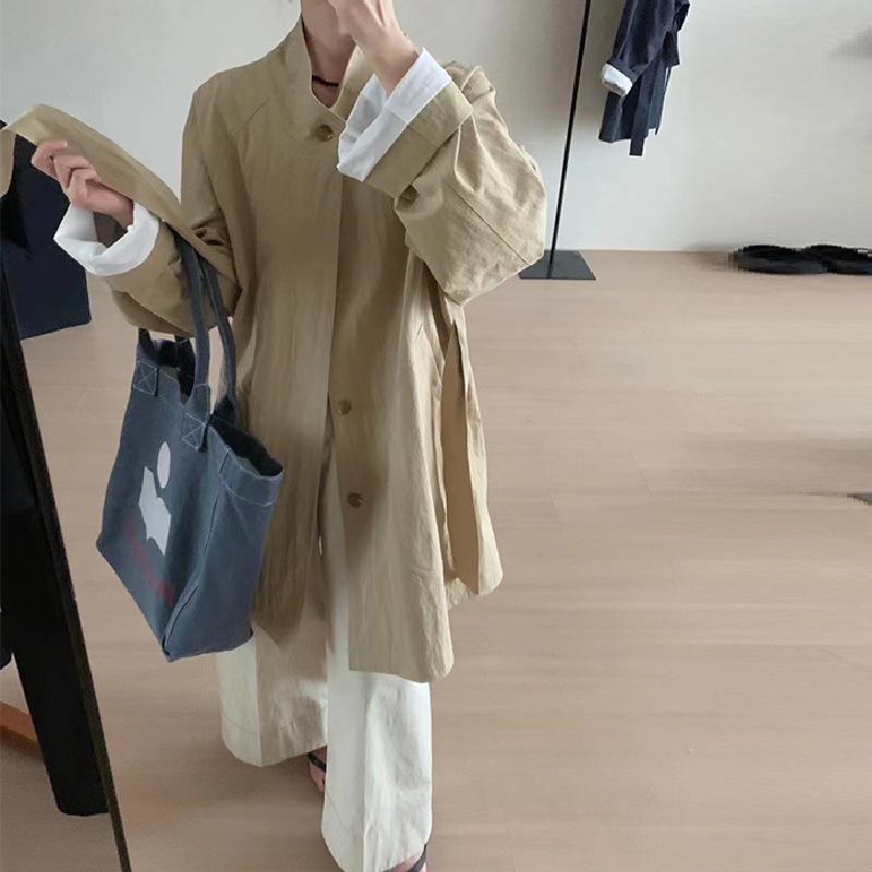 秋冬 コート 女性用 東大門風 スタンドカラー 紐付き ゆったり中長丈 風防 コットン 素材 単色 ミドル厚 ワイドシルエット 長袖 ポケット 切り替え デザイン ベージュ 韓国風 カジュアル 単列ボタン 均一サイズ 日常使い 軽量 吸湿速乾 伸縮性 ハ