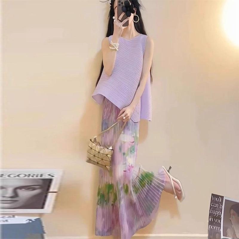 レディース スカートセット 夏服 紫 ノースリーブ トップス 中長丈 スカート 褶? デザイン ポリエステル 素材 清新 甘め スタイル 優しい 雰囲気 ファッション セット 洋気 減齢 効果 スリム 効果 体型カバー 軽量 涼しい 生地 伸縮性 女性 ｜フォークBR 7,803円