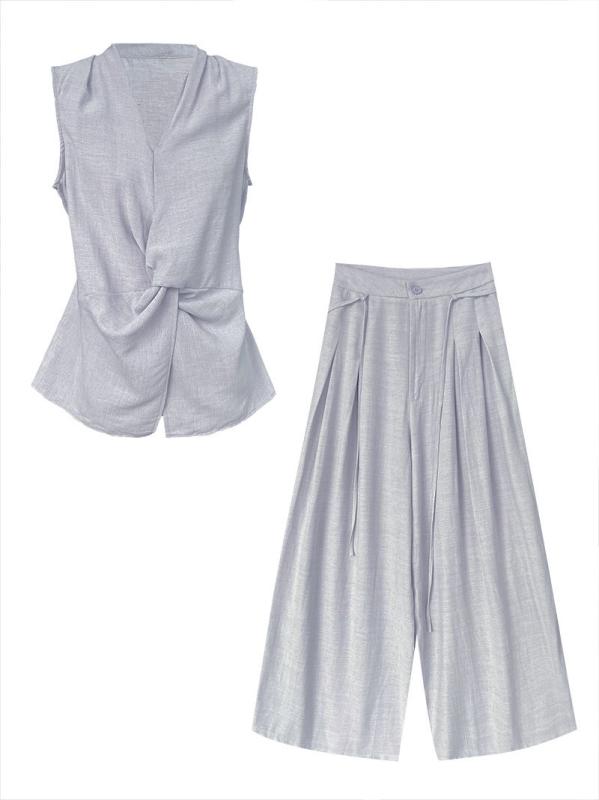 レディース セットアップ 無袖 背心 Vネック ツイスト デザイン ワイドレッグパンツ 麻素材 夏服 純色 黒 杏色 日韓カジュアル スタイル 長ズボン 切り替え加工 修身 シルエット 軽量 通勤 普段使い ゆったり フィット｜フォークBR