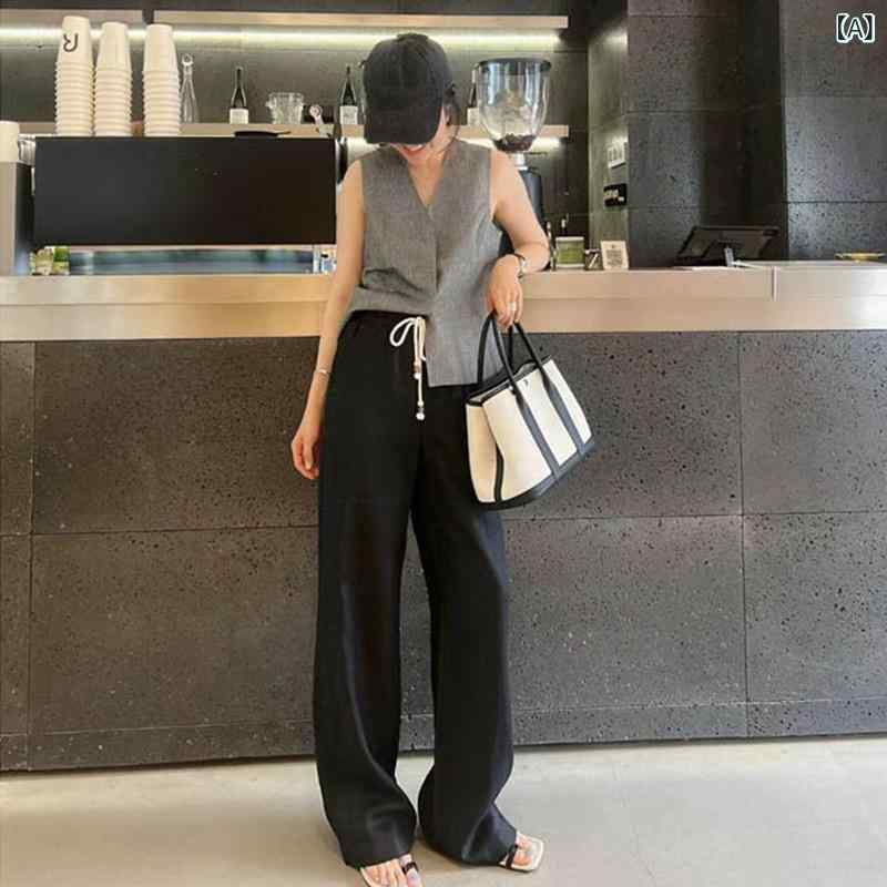 深センの 24 新型の 南 油の お上さん 服の 欧 品の 流行り物 的な 余暇は 縄を 引いて 腰の 天 糸の まっすぐな 筒の 惜しみ無い 足の ズボンの お上さんの 薄べったい 金を 締めます。
