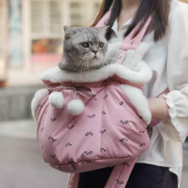 猫 民族大移動 御徒面子 背嚢 いだき締める紐 うしろ側差し交わす 旅する お出かけ 出かける 愛玩動物設備 生あたたかい 秋冬 もこもこ ふわふわ 洗い濯ぎ能力のある ポンポン シュロの葉 衣嚢 可愛らしい 無地 柄 薄墨色 青 サクラ色