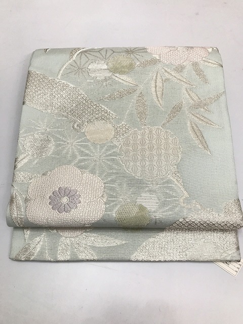 【中古】袋帯 化繊 水色地に雪輪文様 夏帯
