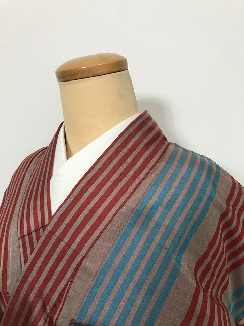 【中古】 子供着物 正絹 ジュニアサイズ 女児用 アンティーク 紬 グレー地に縞文様 袷着物 銘仙 最強配送 シーズン春