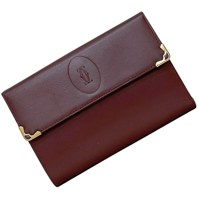 【送料無料】 カルティエ 三つ折り 財布 ec-24342 ボルドー マスト 美品 レザー 中古 Cartier ホック ワンポイント ロゴ ワインレッド シンプル メンズ レディース 男女兼用 定番 人気 小銭入れ有 ヴィンテージ ロゴ刻印 ブランド 本物 鑑定済み