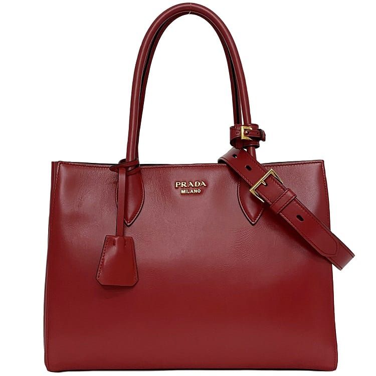 プラダ 2way 御徒面子 ビブリオテーク 赤いこと 黒いこと 1BG098 美品 なめし革 中古 PRADA 分かりやすい 本革 ショルダーバッグ トートバッグ ゴールド金具 赤 ワンポイントロゴタイプ 分かりやすい 独立独歩 定番 一般受け 御洒落 御膳上等感 雅びやか 雅びやか ブランド名 本物 価値づける済み