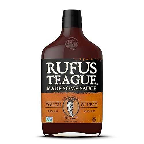 ルーファス ティーグ タッチ O ヒート BBQ ソース、16 オンス - ケースあたり 6 個。 Rufus Teague Touch O Heat BBQ Sauce, 16 Ounce - 6 per case.
